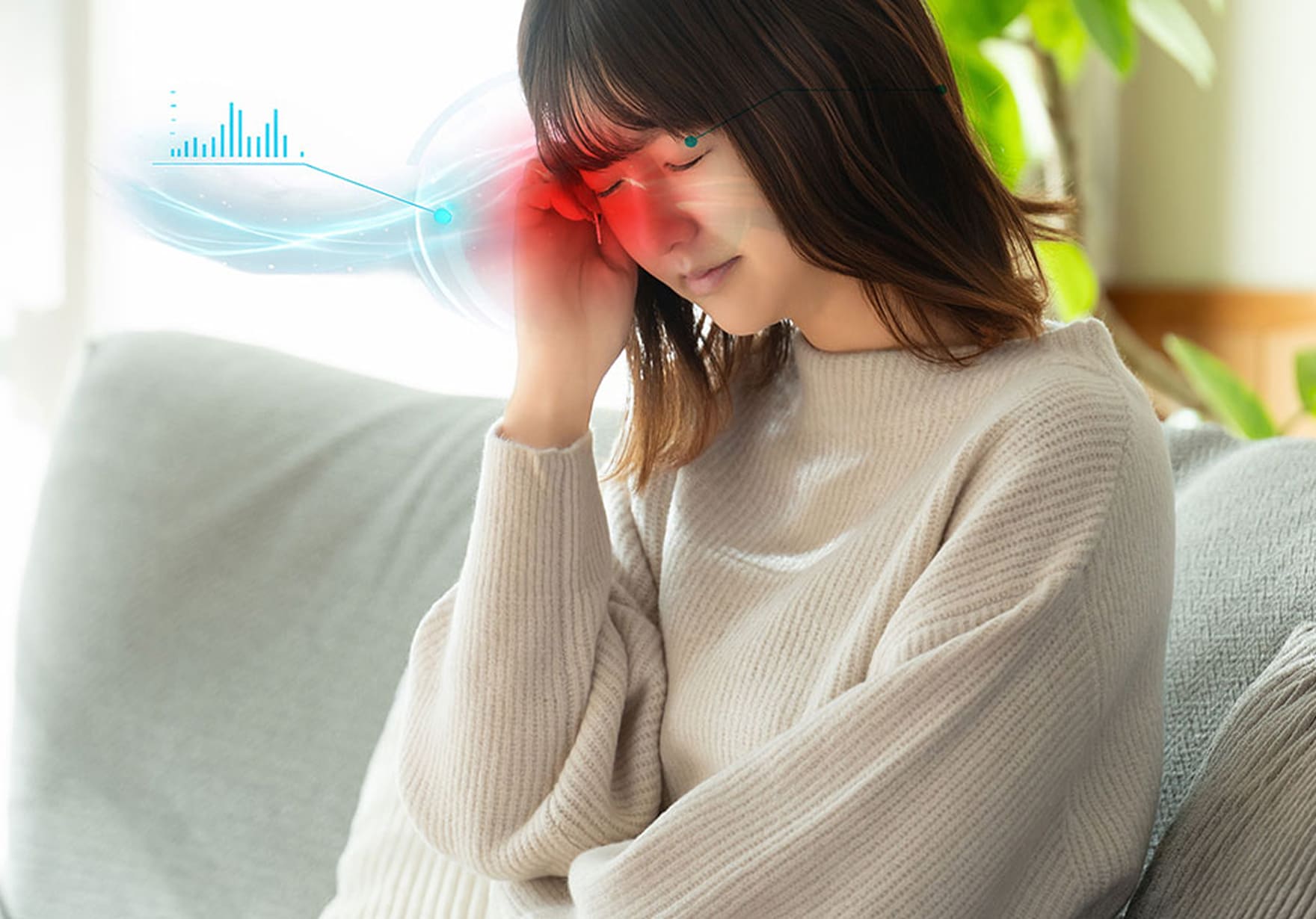 頭痛に悩む女性